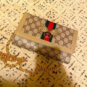 Gucci’s wallet /purse